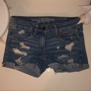 Distressed denim shorts